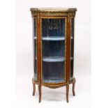 A MAHOGANY AND ORMOLU BOWFRONT VITRINE, 20th Century, with galleried top, glazed door and sides,