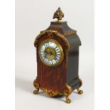 A 19TH CENTURY FRENCH "BOULLE" AND ORMOLU MANTLE CLOCK. 12ins high.