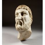 A CARVED MARBLE ROMAN HEAD. 10ins long.