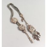 A NOVELTY SILVER HORSE TASSEL WATCH CHAIN.