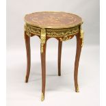 A FRENCH STYLE MARQUETRY AND ORMOLU MOUNTED LAMP TABLE. 1ft 11ins diameter x 2ft 6ins high.