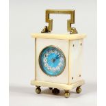 A MINIATURE CARRIAGE CLOCK, with mother-of-pearl case and blue enamel dial. 2.25ins high.