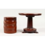 A 19TH CENTURY MINIATURE MAHOGANY CIRCULAR TABLE, and a turned mahogany box and cover. Table 6.25ins