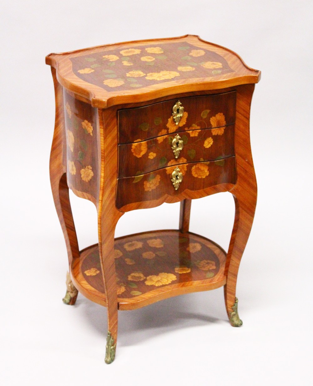 A SMALL 19TH CENTURY FRENCH KINGWOOD AND MARQUETRY CHEST, with floral inlaid serpentine top, three