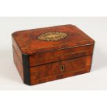 A SMALL 19TH CENTURY FRENCH KINGWOOD JEWELLERY BOX, with brass motif in the top. 6.5ins long.