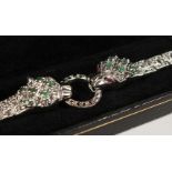 A SILVER, EMERALD AND MARCASITE PANTHER BRACELET.