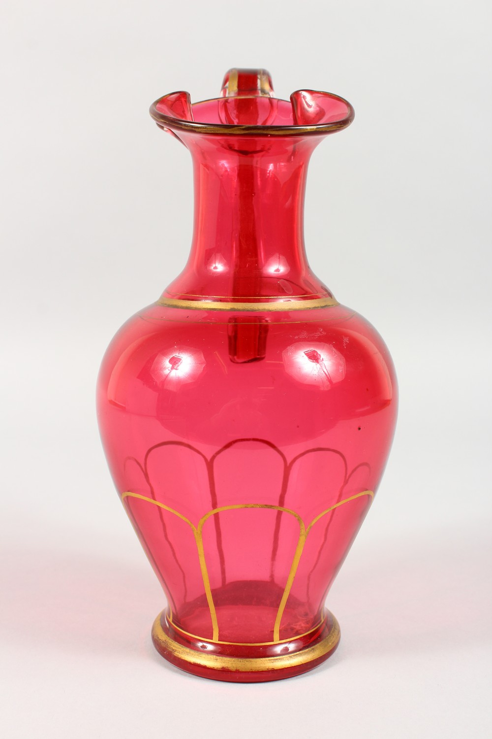 A VICTORIAN RUBY GLASS JUG. 9.5ins high. - Image 6 of 11