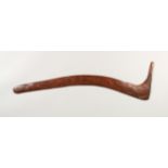 AN OLD SWAN NECK WOODEN BOOMERANG. 2ft 5ins long.