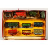 AN "O GAUGE" TINPLATE CLOCKWORK GOODS TRAIN SET, boxed.