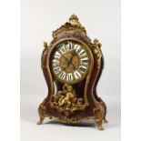 A 19TH CENTURY FRENCH BOULLE BRACKET CLOCK AND BRACKET with scrolls and cupids. Black and white