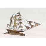 A MINIATURE FILIGREE SILVER THREE MASTED SCHOONER. 6.5ins long.