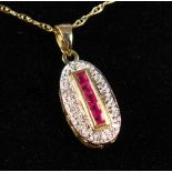 A 9CT GOLD, RUBY AND DIAMOND DECO STYLE NECKLACE.