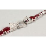 A SILVER RUBY SET PANTHER BRACELET.