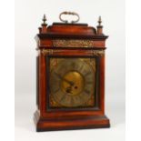 A 19TH CENTURY ROSEWOOD CLOCK with silvered dial. 20ins high.