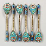A SET OF SIX RUSSIAN SILVER AND ENAMEL SPOONS.