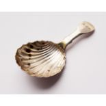 A GEORGE IV SCOTTISH CADDY SPOON. Glasgow 1821. Maker: L.B.