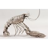 AN ARTICULATED SILVER MODEL OF A LOBSTER. 9ins long.