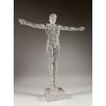 THE GLITTER MAN, a standing figure with arms outstretched. 23ins high.