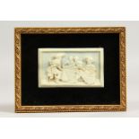 A GOOD SMALL CARVED IVORY PLAQUE, LATE 19TH/EARLY 20TH CENTURY, depicting cavaliers seated around