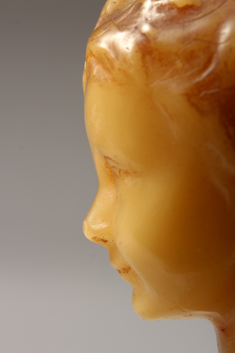 A SMALL GEORGIAN CARVED WAX BUST, head and shoulders of a young boy. 6ins high on a wooden plinth. - Image 5 of 8