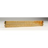 AN IVORY SLIDE RULE, J. Long, 20 Little Tower St., London. 13ins long.