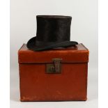 AN OLD TOP HAT, in a fitted case.