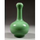 A PALE CELADON GREEN GARLIC NECK BOTTLE VASE. 8ins high.