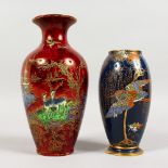 A WILTON WARE RED GROUND LUSTRE VASE, 8ins high, and A BLUE CARLTON VASE, 6ins high (2).