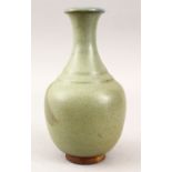 A GOOD JAPANESE STUDIO MOULDED POTTERY VASE, the neck with a graduation glaze, and a black stroke