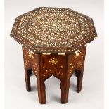 A SMALL 19TH CENTURY INDIAN OCTAGONAL CARVED WOOD & INLAID TABLE, with ivory inlaid formal scroll