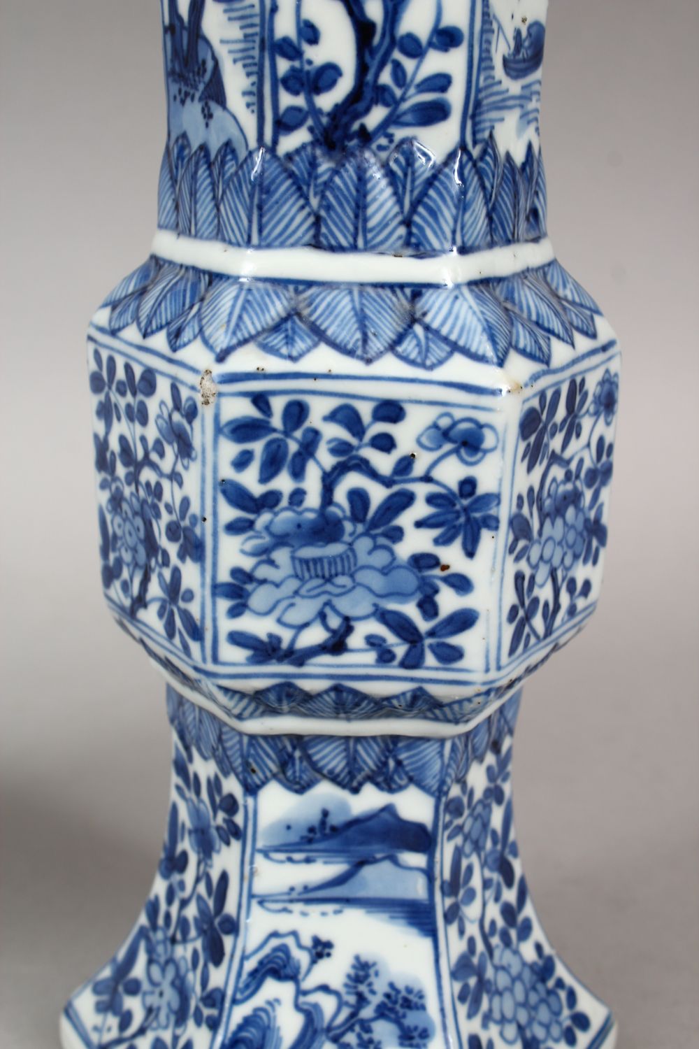 A GOOD PAIR OF 18TH CENTURY CHINESE KANGXI BLUE & WHITE GU SHAPE PORCELAIN VASES, with a multitude - Image 5 of 10