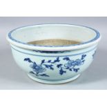 A GOOD CHINESE TRANSITIONAL PERIOD BLUE & WHITE PORCELAIN JARDINIERE, the body decorated with scenes