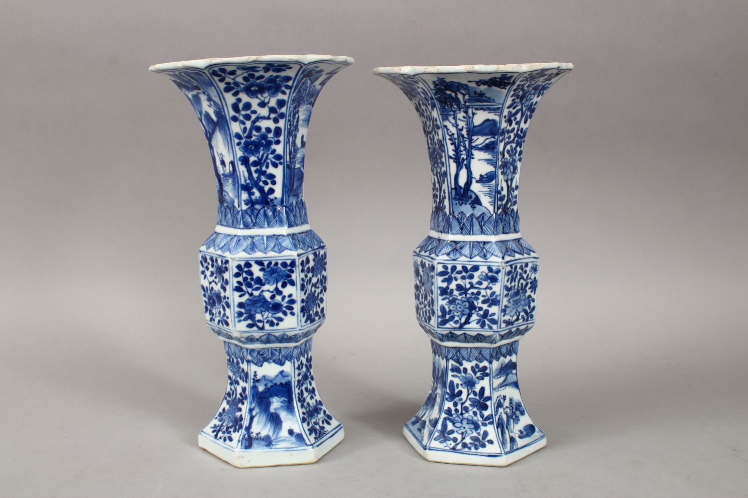 A GOOD PAIR OF 18TH CENTURY CHINESE KANGXI BLUE & WHITE GU SHAPE PORCELAIN VASES, with a multitude - Image 3 of 10