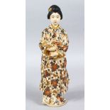 A FINE JAPANESE MEIJI PERIOD IMPERIAL SATSUMA FIGURE OF A LADY & CAT, stood wearing traditional