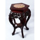 A 19TH CENTURY CHINESE HARDWOOD & MARBLE PLANT STAND, the hexagonal top inset with marble, the