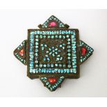 A 19TH CENTURY TIBETAN TURQUOISE ONLAID AMULET BOX, 7cm x 7cm.