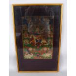 AN 18TH / 19TH CENTURY TIBETAN HAND PAINTED THANKA PICTURE IN FRAME, decorated to depict figure upon