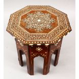 A SMALL 19TH CENTURY INDIAN OCTAGONAL CARVED WOOD & INLAID TABLE, with ivory inlaid formal scroll