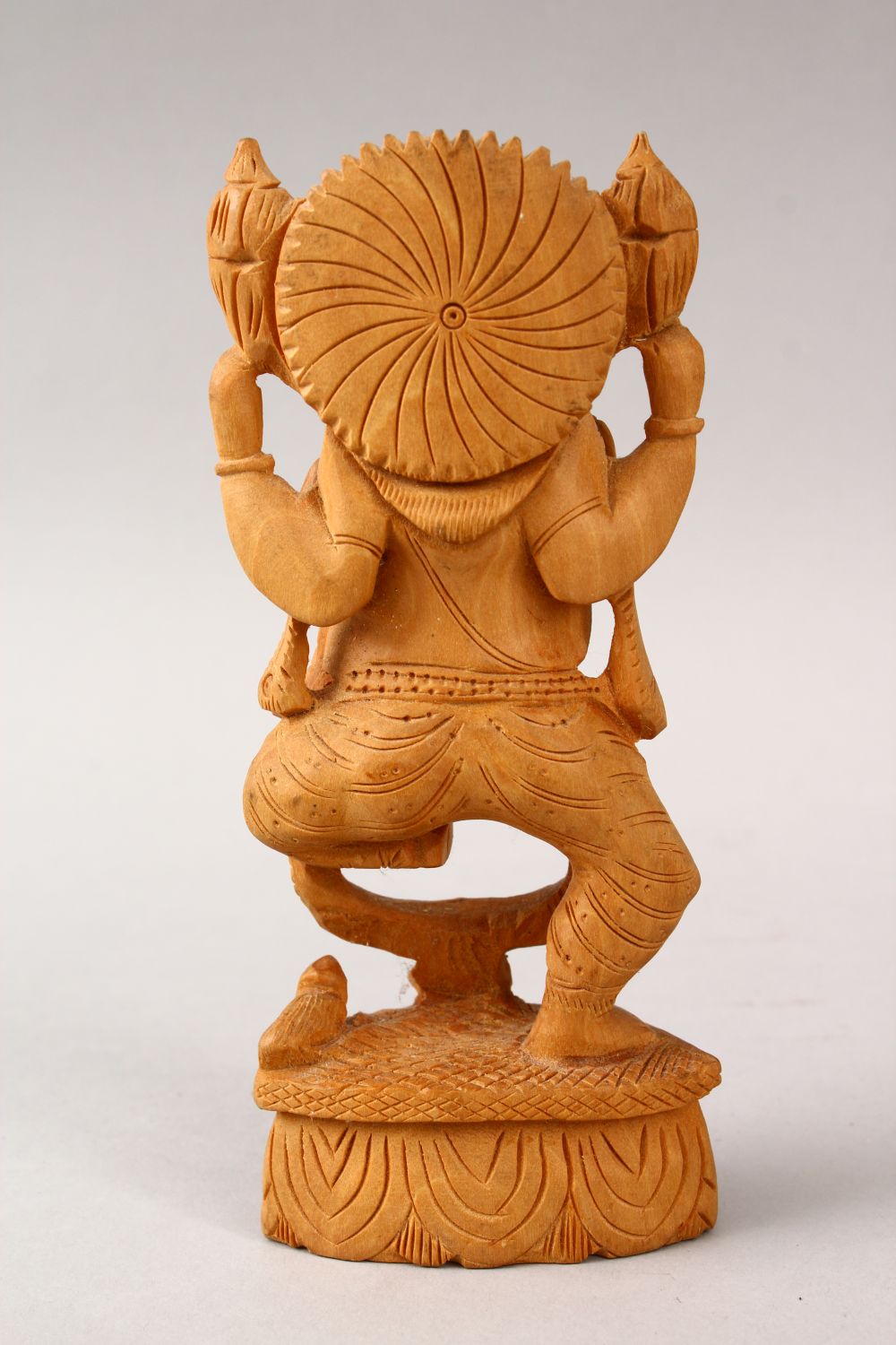 A 20TH CENTURY CARVED WOODEN INDIAN FIGURE OF GANESH, stood upon a carved base, 16cm high - Image 3 of 4