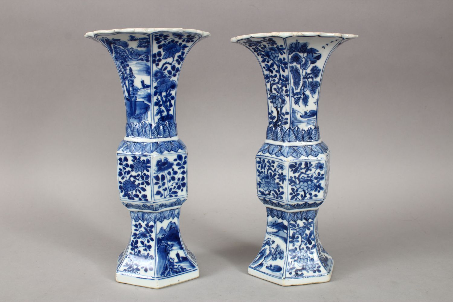 A GOOD PAIR OF 18TH CENTURY CHINESE KANGXI BLUE & WHITE GU SHAPE PORCELAIN VASES, with a multitude - Image 2 of 10