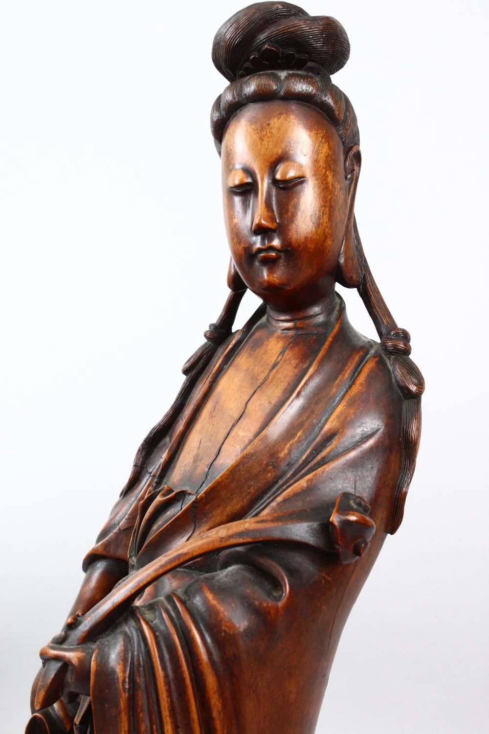 A GOOD 19TH CENTURY CHINESE CARVED HARDWOOD FIGURE OF GUANYIN, stood in traditional attire and - Image 2 of 6