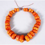 A CHINESE CORAL LIKE HARDSTONE NECKLACE, 44CM APPROX,