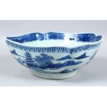 A GOOD CHINESE QIANLONG PERIOD BLUE & WHITE PORCELAIN MOULDED BOWL, the body decorated with