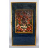 AN 18TH / 19TH CENTURY TIBETAN HAND PAINTED THANKA PICTURE IN FRAME, decorated to depict figures