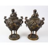A GOOD PAIR OF 19TH / 20TH CENTURY CHINESE BRONZE LIDDED CENSERS, the censers with carved and