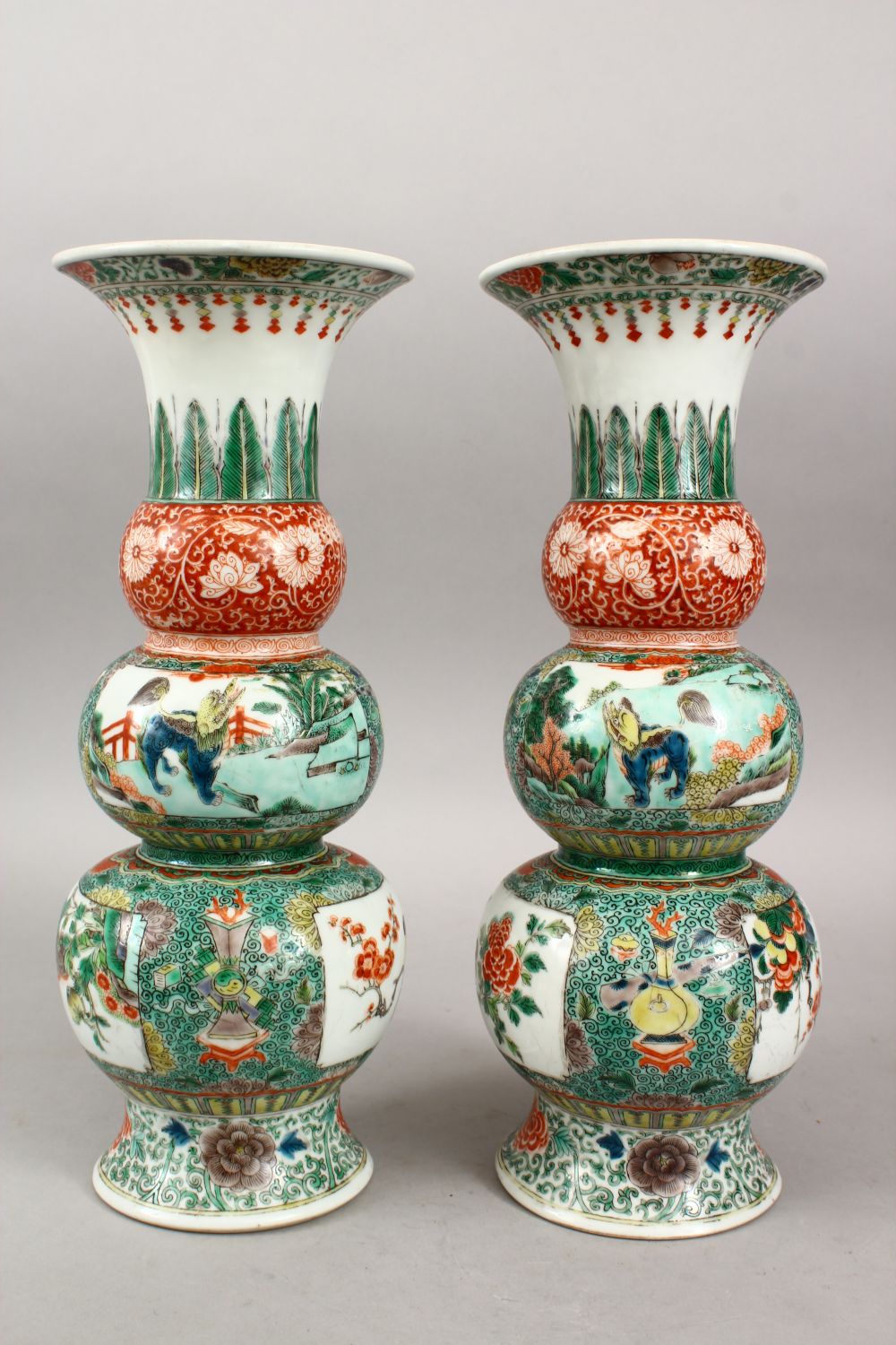 A PAIR OF CHINESE FAMILLE VERTE TRIPLE GOURD PORCELAIN VASES, decorated with panels of lion dogs - Image 4 of 9