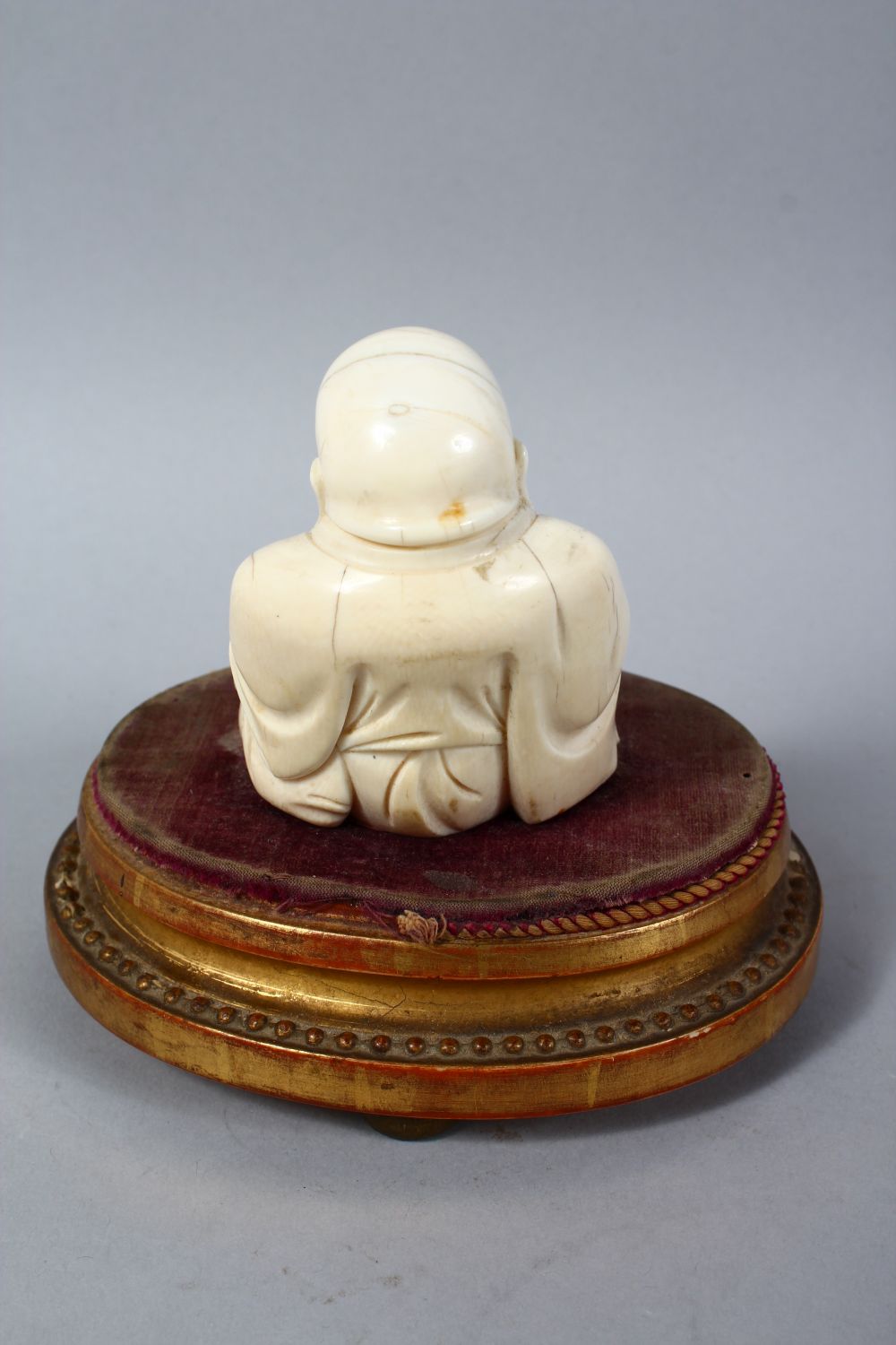 A 19TH CENTURY CHINESE CARVED IVORY BUDDHA ON STAND, the buddha seated upon a later french wooden - Image 4 of 5