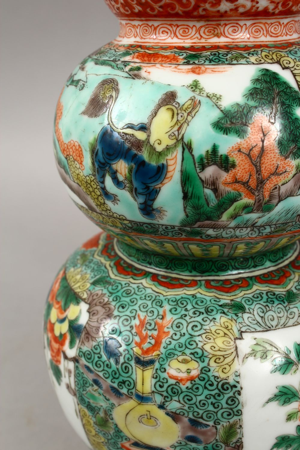 A PAIR OF CHINESE FAMILLE VERTE TRIPLE GOURD PORCELAIN VASES, decorated with panels of lion dogs - Image 7 of 9