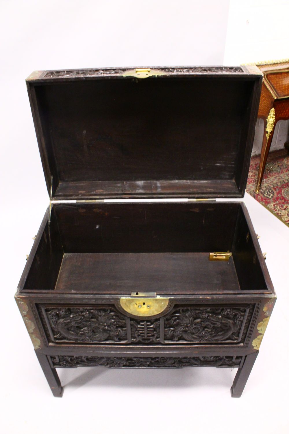 A GOOD 19TH CENTURY CHINESE CARVED HARDWOOD / HONGMU DRAGON CARVED LIDDED CHEST, the panels of the - Image 9 of 9