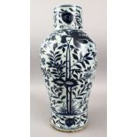 A LARGE CHINESE BLUE & WHITE PORCELAIN BALUSTER VASE, decorated with scenes of formal scrolling